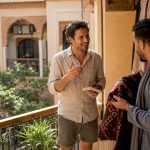 Traveler practicing Moroccan spoken language in market